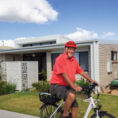 Retiree cycling in the Taigum Village